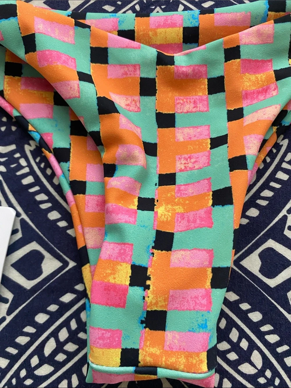 Skatie ' bikini bottoms in a colorful checkered "RADICAL" print - Picture 3 of 6
